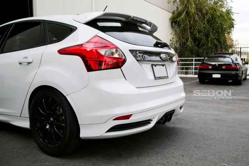 Seibon 12-13 Ford Focus 4 Door Carbon Fiber Tail Garnish 1